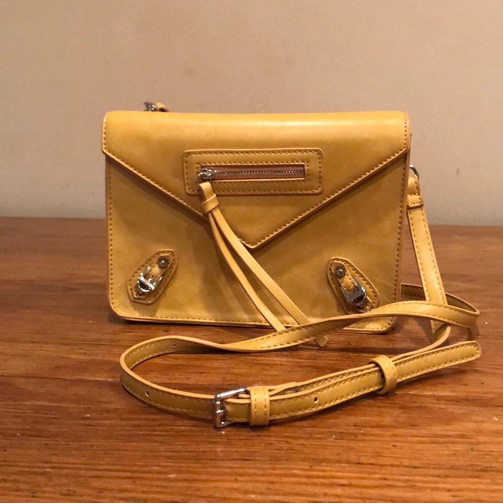 Stylish  mustard cross-body handbag.